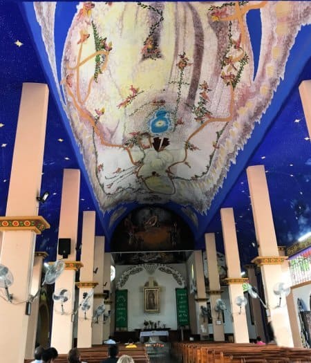 La Crucecita Church mural with Virgin of Guadalupe